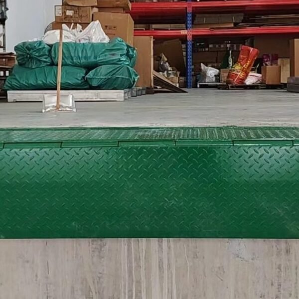 Mechanical Edge of Dock Leveler mounted at dock face