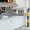 Mechanical Edge of Dock Leveler spring linkage Mechanical Edge of Dock Leveler spring linkage