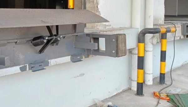 Mechanical Edge of Dock Leveler spring linkage Mechanical Edge of Dock Leveler spring linkage